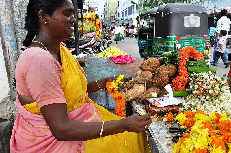 File:Woman-making-flower-garlands.jpg